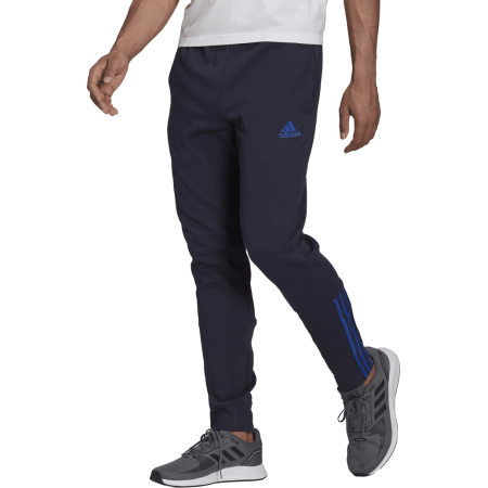Vyriškos mėlynos Adidas 3-Stripes M Double Knit Pants H12210 sportinės kelnės su trimis baltais šonų juostelėmis ir elastingais manžetais.