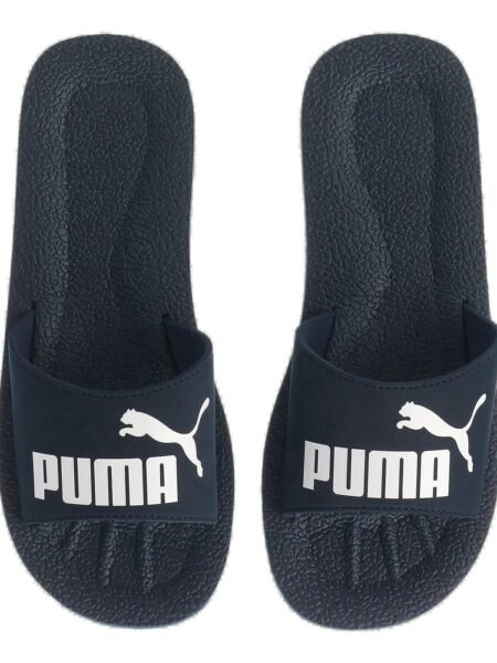 Puma vyriškos šlepetės Purecat Slide 360262-02 – mėlynos, lengvos, su baltu logotipu, tinkamos baseinui ir paplūdimiui.