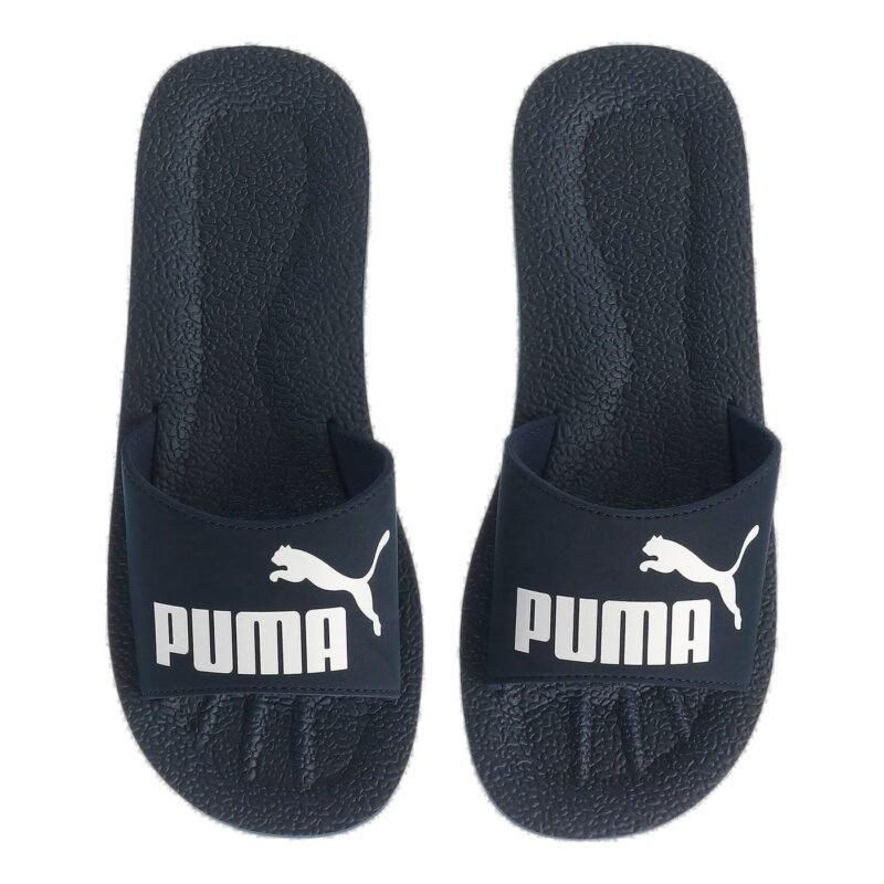 Puma vyriškos šlepetės Purecat Slide 360262-02 – mėlynos, lengvos, su baltu logotipu, tinkamos baseinui ir paplūdimiui.