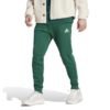 Adidas Essentials vyriškos žalios sportinės kelnės IJ8892 su siaurėjančiu kirpimu, kišenėmis ir elastingais manžetais.