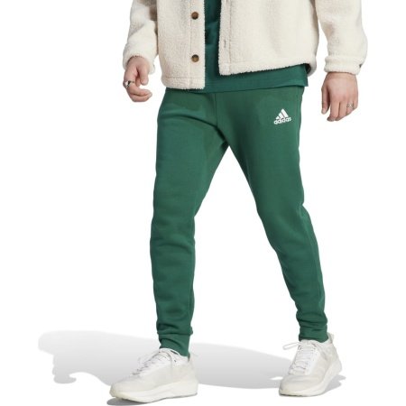 Adidas Essentials vyriškos žalios sportinės kelnės IJ8892 su siaurėjančiu kirpimu, kišenėmis ir elastingais manžetais.