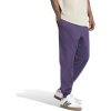 Violetinės vyriškos sportinės kelnės Adidas Essentials Tapered Feelcozy Fleece JX3317 su pašiltinimu ir kišenėmis.