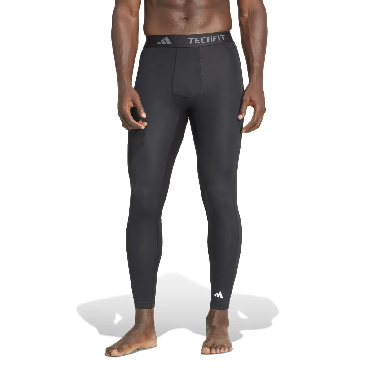 Juodos vyriškos kompresinės tamprės sportui bėgimui Adidas Techfit IN5590.