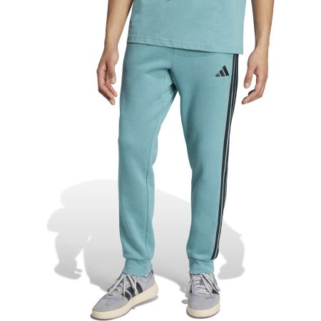 Adidas vyriškos sportinės kelnės Essentials 3-Stripes TC Fleece Pants JX0711 – šviesiai žalios fleece kelnės su juodomis juostelėmis.