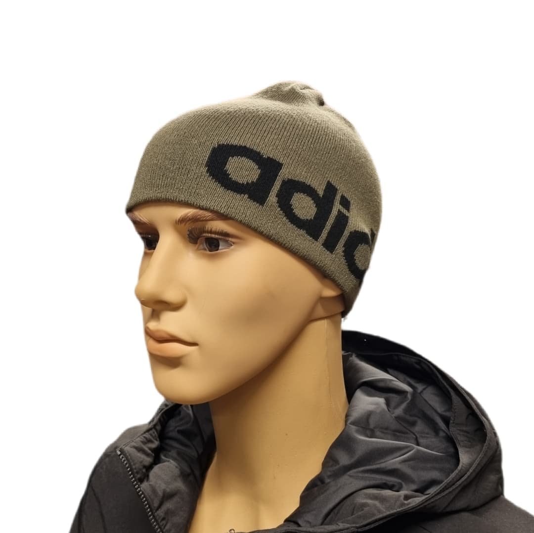 Adidas žieminė kepurė Daily Beanie JY3161 žalia chaki su juodu logotipu tinka vyrams ir moterims