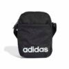 Juoda Adidas Linear Organizer JE8341 rankinė per petį su baltu Adidas logotipu ir reguliuojamu dirželiu.